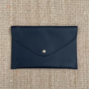 JCrew Navy and Hold leather pouch purse.